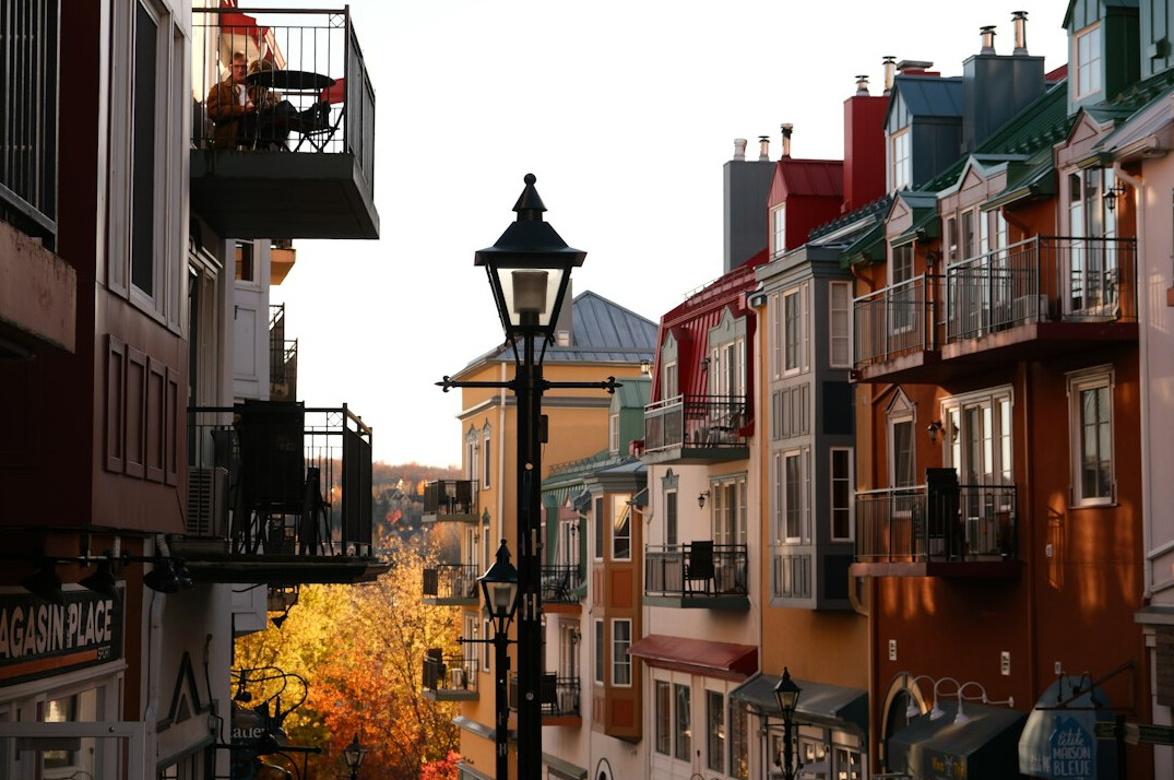 Cobblestone street lined with colourful buildings in Old Quebec City